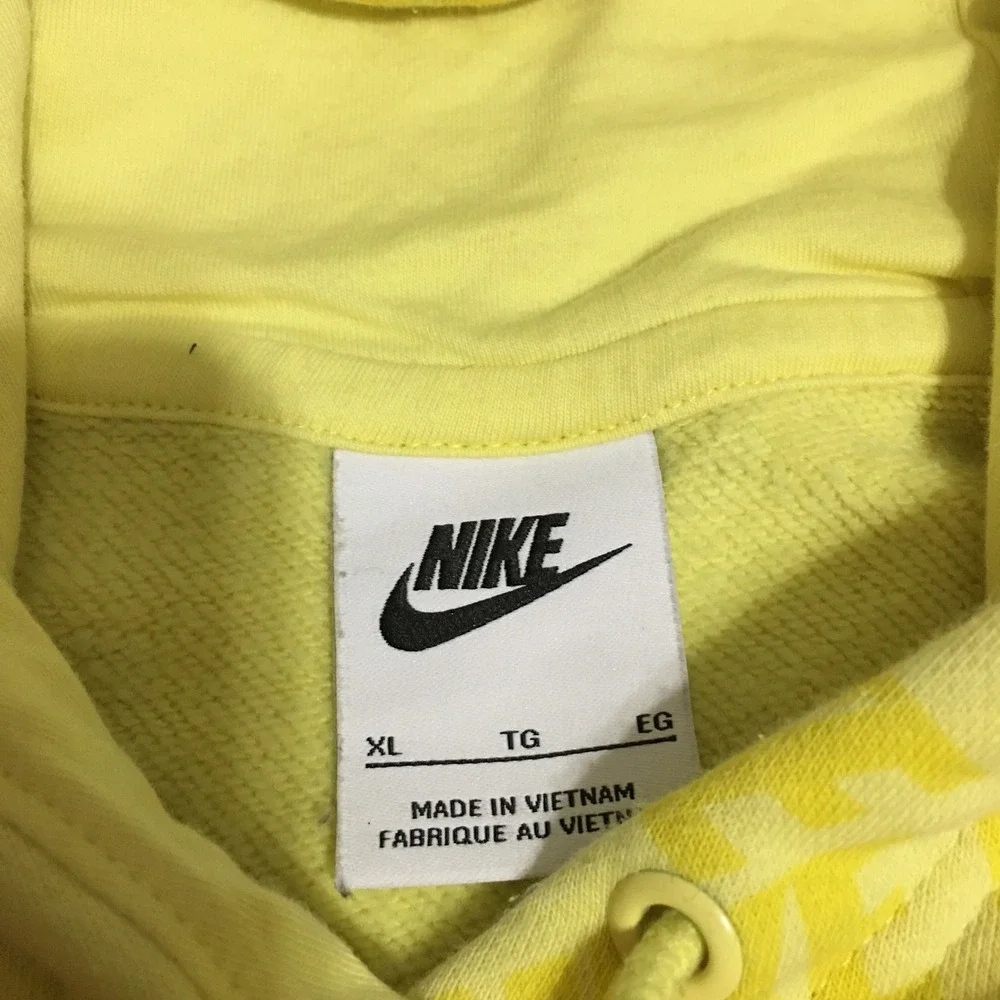 Nike Sportswear Essentials Pullover Hoodie Womens XL Yellow All Over Print Logo